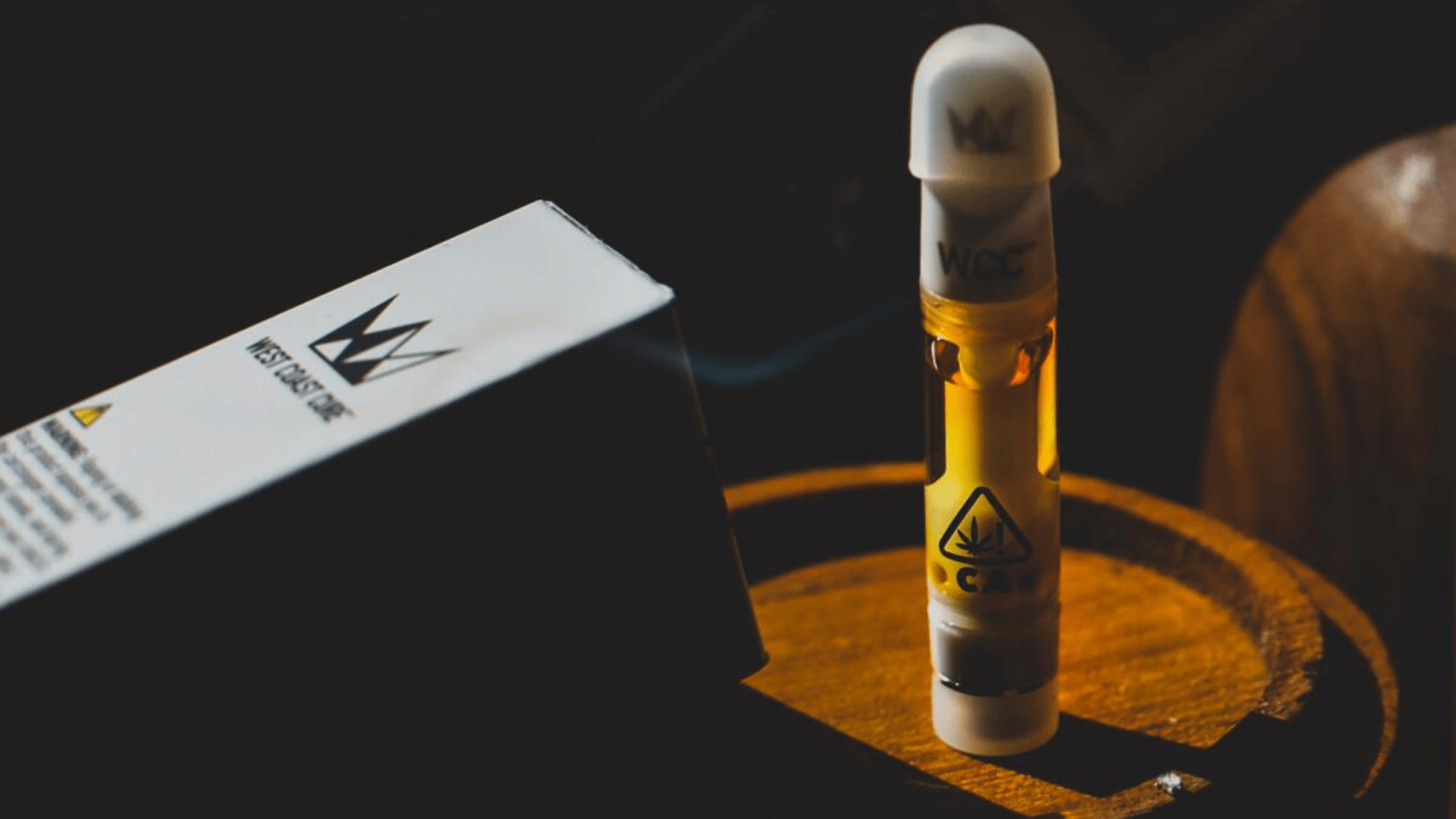 West Coast Cure cannabis vape cartridge and packaging representing the brand's premium products