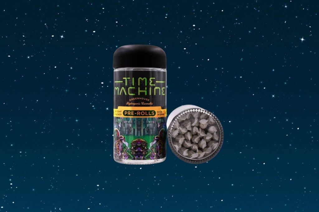 Time Machine Pre-Rolls – A pack of 28 Blue Dream cannabis pre-rolls displayed against a cosmic-themed background.