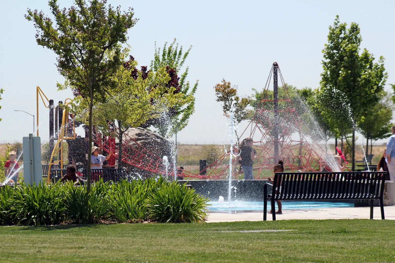 stone-creek-community-park Children playing at splash pad in Stone Creek Community Park, Rancho Cordova, CA